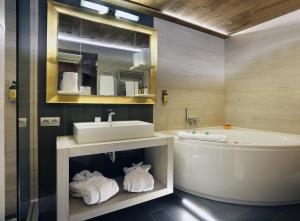Ett badrum på Hotel 3 Vallées Val Thorens
