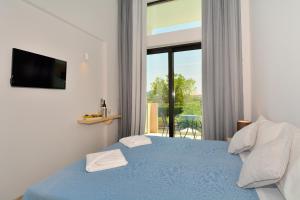 Postel nebo postele na pokoji v ubytování Selyria Resort + 13 fotografií
