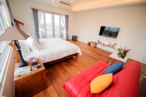 TV a/nebo společenská místnost v ubytování Dreams Come True B&B