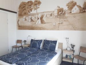 Tempat tidur dalam kamar di B&B Johannesberg