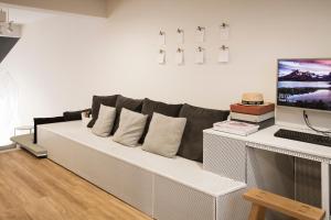 TV a/nebo společenská místnost v ubytování Bed One Block Hostel