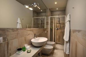 Koupelna v ubytování Hotel Concord