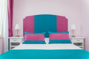 מיטה או מיטות בחדר ב-Villa Eliana