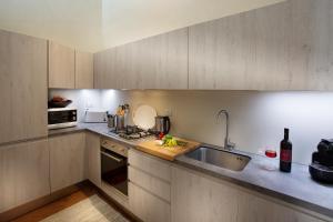 Kuchyň nebo kuchyňský kout v ubytování Roveta Apartment