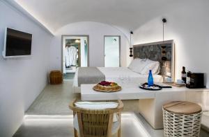 TV a/nebo společenská místnost v ubytování Aperto Suites - Adults Only