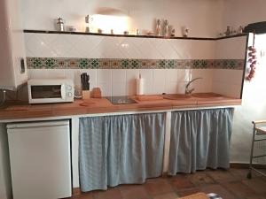 Cuisine ou kitchenette dans l'établissement Conjunto Rural Casa Victoria