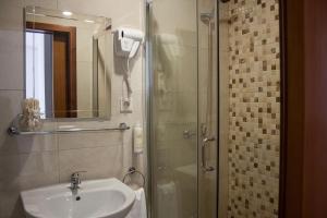 Ένα μπάνιο στο Nations Porto - Studios & Suites +32 φωτογραφίες