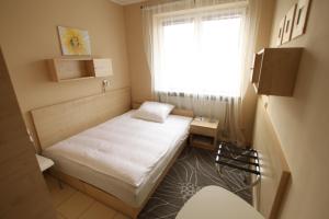 Posteľ alebo postele v izbe v ubytovaní Standard Delegacyjny Bed & Breakfast