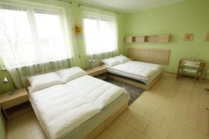 Posteľ alebo postele v izbe v ubytovaní Standard Delegacyjny Bed & Breakfast