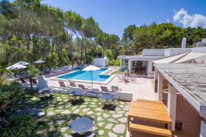 an aerial view of a house with a swimming pool at Casbah Formentera Hotel & Restaurant in Playa Migjorn