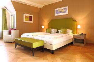 Ένα ή περισσότερα κρεβάτια σε δωμάτιο στο Hotel Rappensberger
