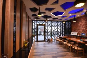 Restaurace v ubytování 羅東以馬內利電梯民宿 近羅東及清溝夜市