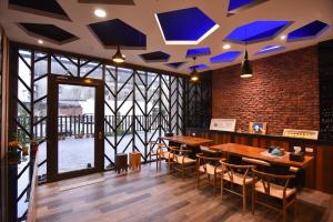 Restaurace v ubytování 羅東以馬內利電梯民宿 近羅東及清溝夜市