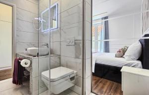 a bathroom with a shower with a toilet and a sink at Mincheta - Luxury Rooms in Primošten +40 photos
