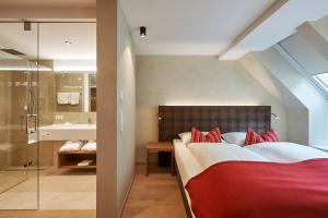 Letto o letti in una camera di Après Post Hotel