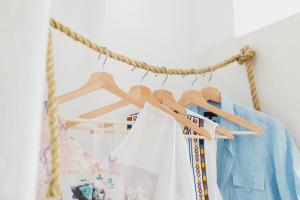 a group of clothes hanging on a rope at Viva Mare Traditional Studios in Astypalaia