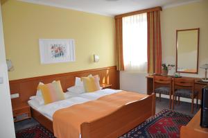 Postel nebo postele na pokoji v ubytování Hotel Schilcherlandhof