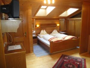 Postel nebo postele na pokoji v ubytování Pension & Appartement Steinwender