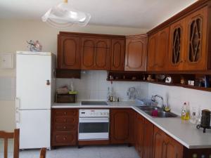 A kitchen or kitchenette at Aphrodite's House