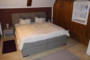 Postel nebo postele na pokoji v ubytování Ferienhaus Tooren