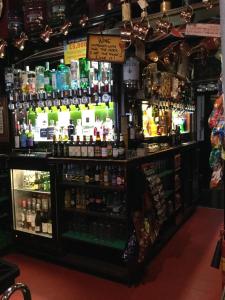 a bar with a lot of bottles of alcohol at The Exhibition in York +53 photos