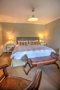Un pat sau paturi într-o cameră la Pavetta Country House