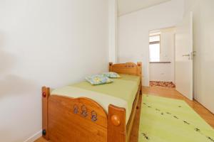 A bed or beds in a room at Antiga Casa do Boi