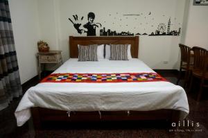 Letto o letti in una camera di Tainan Yi Home