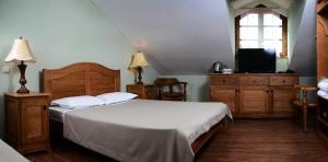 Кровать или кровати в номере Hotel Brigitte