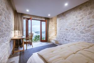 Postel nebo postele na pokoji v ubytování Topas Ecolodge + 37 fotografií