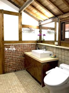 Kylpyhuone majoituspaikassa Bamboo House