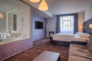 TV in/ali zabaviščno središče v nastanitvi Hotel Galatea