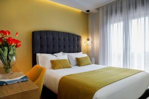 Posteľ alebo postele v izbe v ubytovaní Hotel Val Convention