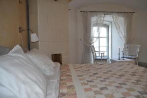 Postel nebo postele na pokoji v ubytování Kastellet Bed & Breakfast