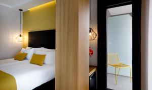 Posteľ alebo postele v izbe v ubytovaní Hotel Val Convention