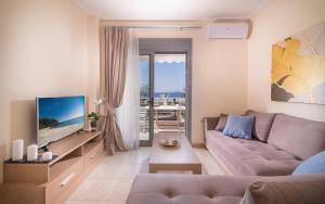 Et tv og/eller underholdning på Allea Hotel and Apartments