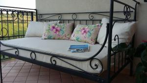 En eller flere senge i et værelse på La Casa Di Stefania