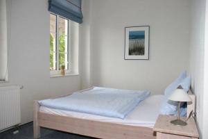 En eller flere senge i et værelse på Villa Azur WE18149