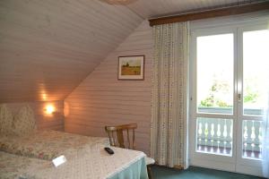 Letto o letti in una camera di Haus Kärnten