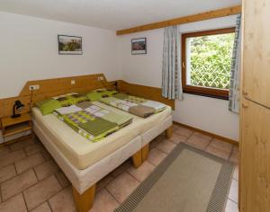 Postel nebo postele na pokoji v ubytování Haus Thomas