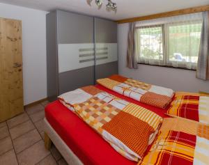 Postel nebo postele na pokoji v ubytování Haus Thomas