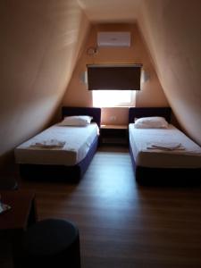 Postel nebo postele na pokoji v ubytování Casa Dalena