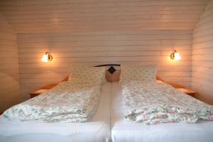Letto o letti in una camera di Haus Kärnten