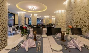 En restaurant eller et andet spisested på Hotel Ayoub & Spa