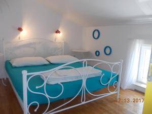 Postel nebo postele na pokoji v ubytování Apartments Blue Sea