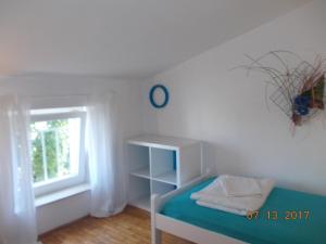 Postel nebo postele na pokoji v ubytování Apartments Blue Sea