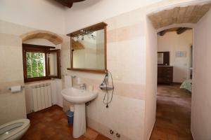 a bathroom with a sink and a toilet at B&B Borgo Marano in Cupra Marittima +33 photos