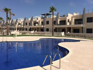 Bazén v ubytování Playa Elisa Bay nebo v jeho okolí