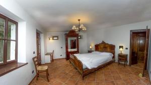 Albergo Diffuso Balcone sul Friuliにあるベッド