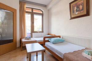 Cama o camas de una habitación en Kukunesh Apartments